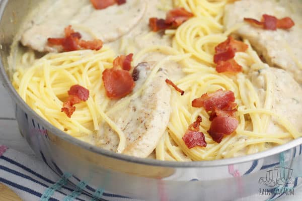 chicken carbonara ready to serve in a skillet pan