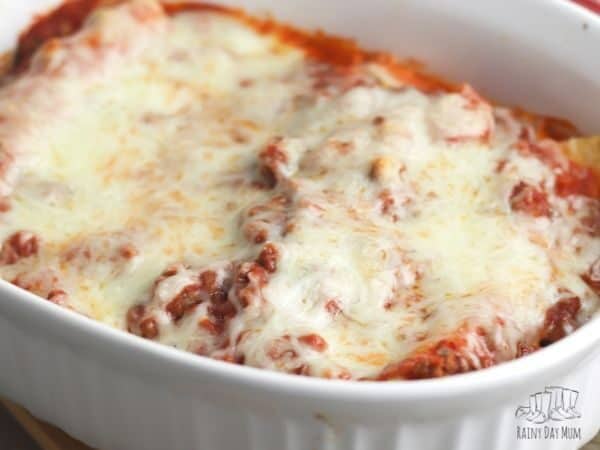 baked beef cannelloni with melted cheese in the baking dish ready for serving