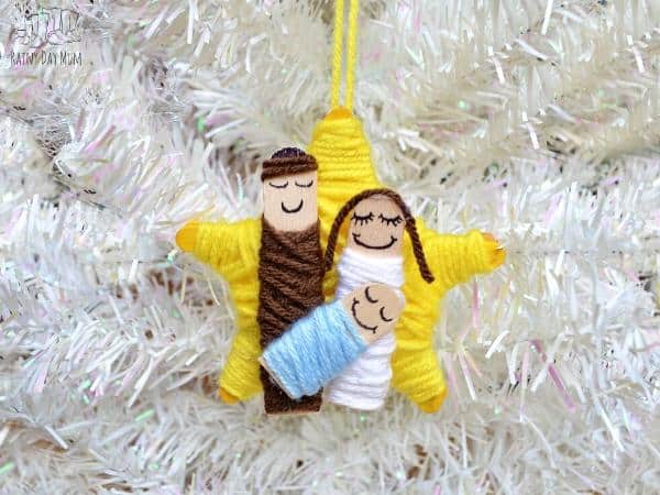simple nativity ornament craft to make with craft sticks and yarn