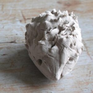 Winter Animal Craft for Toddlers and Preschoolers to make a Clay Hedgehog with cutting practice.