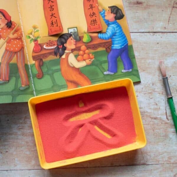 Chinese New Year Sand Tray for Prewriting and Mark Making with Toddlers and Preschoolers