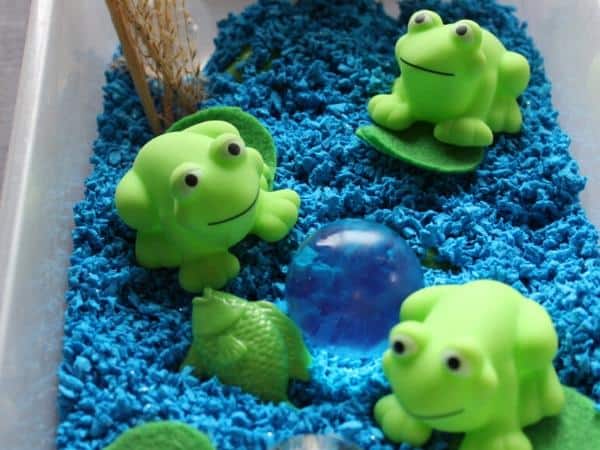 five little speckled frog sensory bin for toddlers and preschoolers
