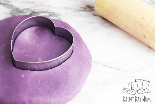 close up of purple scented homemade playdough with cream-of-tartar