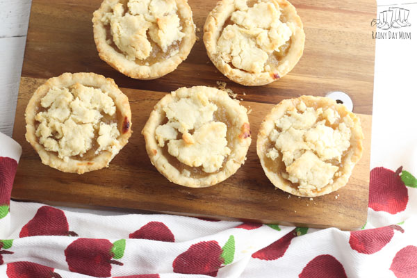 top down view of 5 apple pies which can be cooked with kids