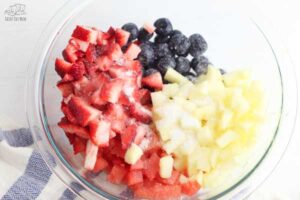 fruit salad sprinkled with sugar for extra sweetness