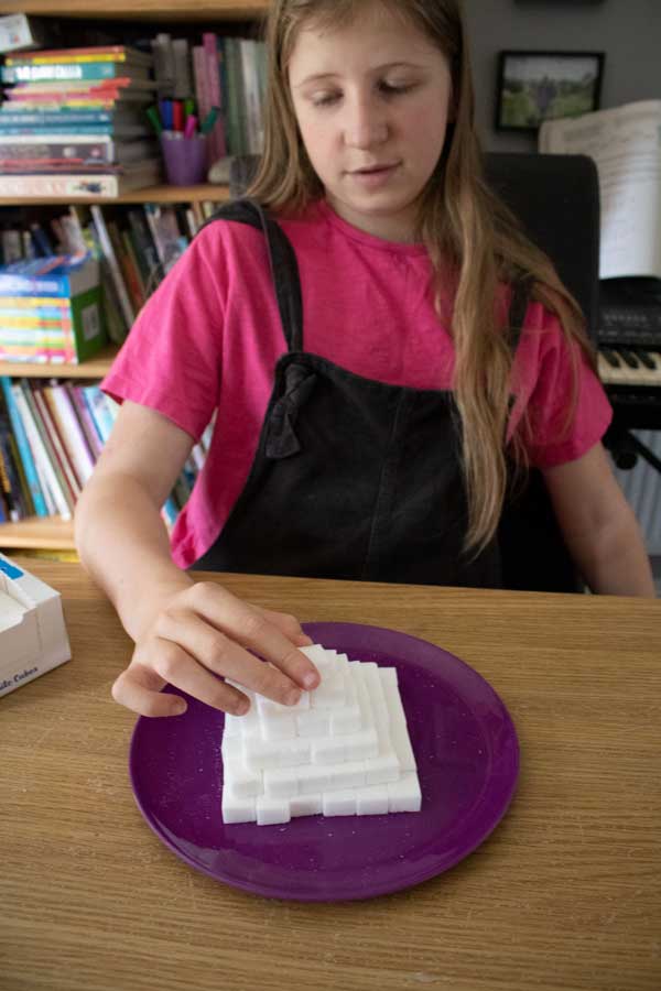 tween adding the final sugar cube to a square based pyramid