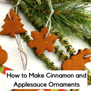 cinnamon and applesauce christmas tree ornaments on a branch of the christmas tree text reads How to Make Cinnamon and Applesauce Ornaments