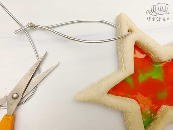 ribbon or string to hang salt dough stars with stained glass centers on the christmas tree
