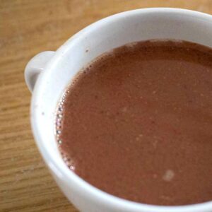 a cup of xocolatl made in a history lesson on Ancient Mayan food and drink
