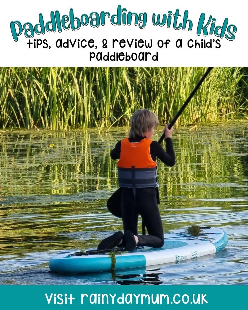 A child kneeling on a paddleboard on a river. The text reads Paddleboarding with Kids, tips, advice and review of a Kids Paddleboard